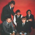 The group, with Eric Clapton